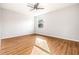 Spacious bedroom with hardwood floors and a large window at 6117 E 113Th Ave, Temple Terrace, FL 33617