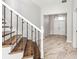 Bright entryway with marble floors and double front doors at 6117 E 113Th Ave, Temple Terrace, FL 33617