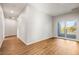 Long hallway with access to balcony at 6117 E 113Th Ave, Temple Terrace, FL 33617