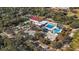 Aerial view of community recreation area with pool, tennis courts, and clubhouse at 6117 E 113Th Ave, Temple Terrace, FL 33617
