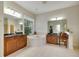 Large bathroom with double vanity, soaking tub, and walk-in shower at 620 Mirabay Blvd, Apollo Beach, FL 33572