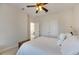 Well-lit bedroom with double doors and a ceiling fan at 620 Mirabay Blvd, Apollo Beach, FL 33572