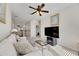 Bonus room showcasing a cozy sofa and glass coffee table at 620 Mirabay Blvd, Apollo Beach, FL 33572