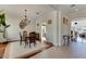 Elegant dining room featuring hardwood floors, chandelier, and a formal dining set at 620 Mirabay Blvd, Apollo Beach, FL 33572