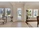 Elegant entryway with tiled floors, a large door, and ample natural light at 620 Mirabay Blvd, Apollo Beach, FL 33572