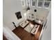 High-ceiling living room with hardwood floors and abundant natural light at 620 Mirabay Blvd, Apollo Beach, FL 33572