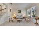 Cozy living room featuring a decorative fireplace, neutral color palette, and comfortable seating arrangement at 620 Mirabay Blvd, Apollo Beach, FL 33572