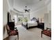 Spacious main bedroom with large windows, ceiling fan, and ample natural light at 620 Mirabay Blvd, Apollo Beach, FL 33572