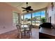 Relaxing screened porch with outdoor seating and canal views at 620 Mirabay Blvd, Apollo Beach, FL 33572