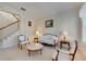 Sitting room with hardwood floors, neutral walls, and comfortable seating at 620 Mirabay Blvd, Apollo Beach, FL 33572