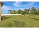 Large backyard with grassy lawn and privacy fence at 807 Garden Oaks Sq, Seffner, FL 33584