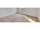 Bright bedroom with carpeted floors and a window at 807 Garden Oaks Sq, Seffner, FL 33584
