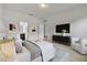 Well-lit main bedroom with comfortable decor, attached bathroom, and plush carpeting at 807 Garden Oaks Sq, Seffner, FL 33584