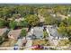 An aerial view showcasing a house's curb appeal and neighborhood context at 8416 N Semmes St, Tampa, FL 33604