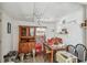 Small dining area with wood table and chairs at 8416 N Semmes St, Tampa, FL 33604