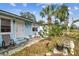 Light blue house with small front porch at 8416 N Semmes St, Tampa, FL 33604