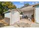 Exterior view of a small storage shed at 8416 N Semmes St, Tampa, FL 33604