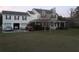 House with attached garage, spacious yard, and driveway at 13621 Mcintosh Rd, Thonotosassa, FL 33592