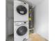 Stackable washer and dryer in dedicated laundry area at 10206 Lola St, Tampa, FL 33612