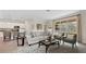 Living area featuring a neutral color palette and comfy seating at 10615 Sun Drop St, Venice, FL 34293