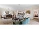 Open living space with views into the kitchen and bedroom at 10615 Sun Drop St, Venice, FL 34293