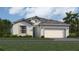 One-story home with two-car garage and landscaping at 10741 Buttercup Ct, Venice, FL 34293