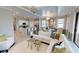 Open living area with sectional sofa and kitchen views at 10741 Buttercup Ct, Venice, FL 34293