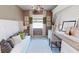 Home office with built-in desk and window seat at 10741 Buttercup Ct, Venice, FL 34293