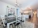 Farmhouse-style dining room with a view of the kitchen at 12969 Brookside Moss Dr, Riverview, FL 33579