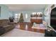 Hardwood floor living room with a Christmas tree and furniture at 1601 Lakeview Rd, Clearwater, FL 33756