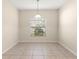 Simple breakfast nook with tile flooring and a window at 2719 Garden Falls Dr, Brandon, FL 33511