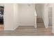 Bright dining room with laminate wood flooring and staircase at 2719 Garden Falls Dr, Brandon, FL 33511