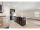 Modern kitchen with dark wood cabinets and granite countertops at 2719 Garden Falls Dr, Brandon, FL 33511