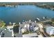 Aerial view of waterfront condo community with pool and private docks at 3127 W Sligh Ave # 203B, Tampa, FL 33614