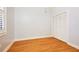 Spacious bedroom featuring hardwood floors and built-in closet at 3127 W Sligh Ave # 203B, Tampa, FL 33614