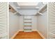 Walk-in closet with shelving and hanging rods at 3127 W Sligh Ave # 203B, Tampa, FL 33614