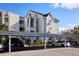 Covered parking area with parking spaces for residents at 3127 W Sligh Ave # 203B, Tampa, FL 33614
