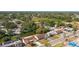 Aerial view showing home's location and canal at 3438 Moog Rd, Holiday, FL 34691