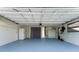 Clean and spacious garage with ample storage at 3438 Moog Rd, Holiday, FL 34691