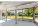 Spacious screened porch overlooking a canal at 3438 Moog Rd, Holiday, FL 34691