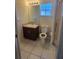 Clean bathroom with single vanity, toilet, and shower at 37500 Laurel Hammock Dr, Zephyrhills, FL 33541