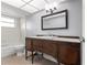 Bathroom features vintage vanity and updated shower at 5108 Brittany S Dr # 506, St Petersburg, FL 33715
