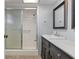 Bathroom with vanity, shower and tile floors at 5108 Brittany S Dr # 506, St Petersburg, FL 33715