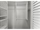 Large closet with double hanging rods and shelves at 5108 Brittany S Dr # 506, St Petersburg, FL 33715