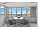 Bright dining area with water views and seating for four at 5108 Brittany S Dr # 506, St Petersburg, FL 33715