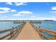 Wooden community dock extending into the water at 5108 Brittany S Dr # 506, St Petersburg, FL 33715