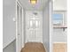 Apartment entry hallway with tiled floor and closet at 5108 Brittany S Dr # 506, St Petersburg, FL 33715