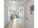Building hallway with seating area and fire alarm at 5108 Brittany S Dr # 506, St Petersburg, FL 33715