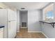 Kitchen area with white appliances and a breakfast bar at 5108 Brittany S Dr # 506, St Petersburg, FL 33715
