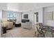 Spacious living room with water views and dining area at 5108 Brittany S Dr # 506, St Petersburg, FL 33715
